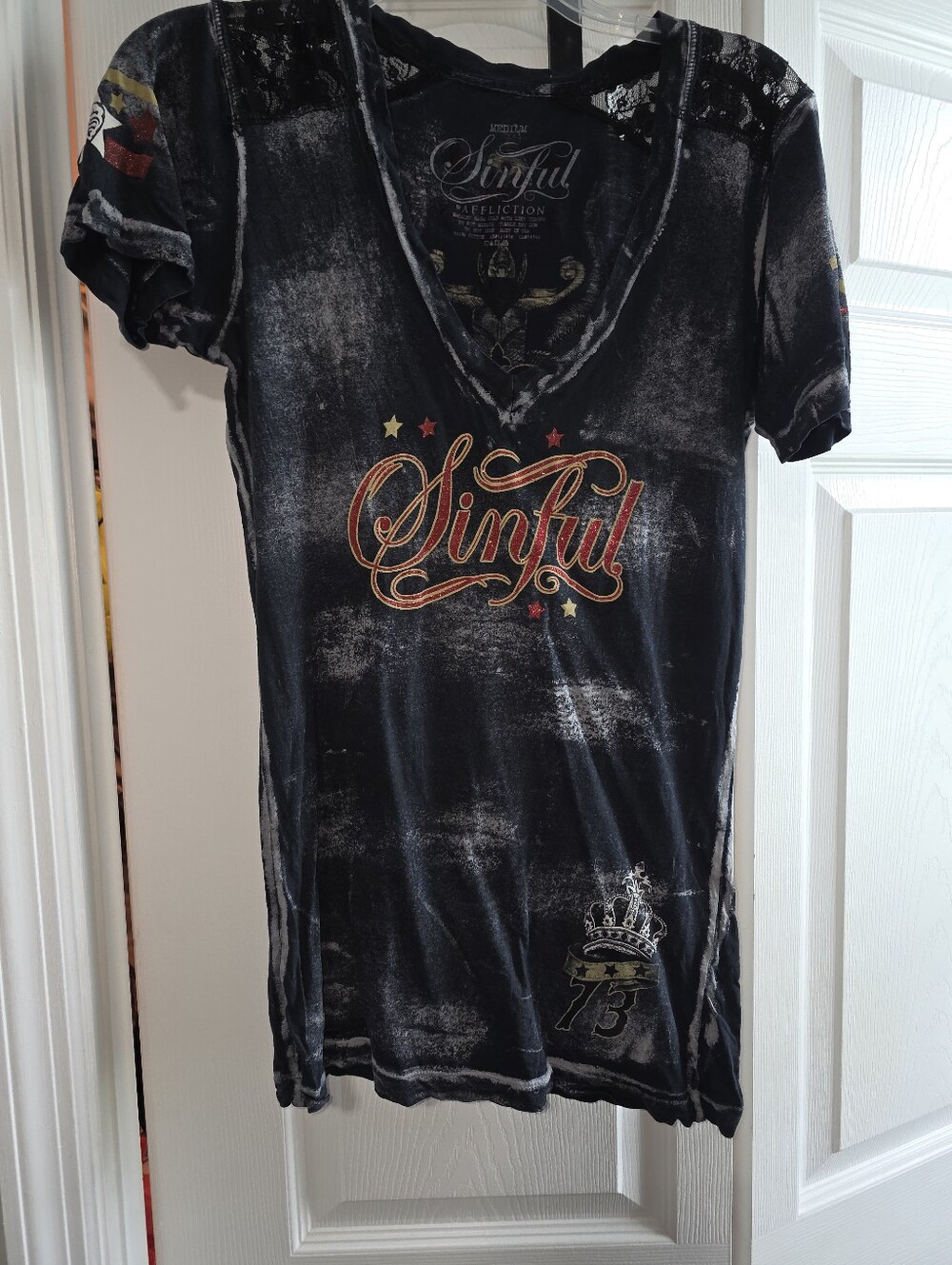 Affliction Black V‑Neck 'Sinful' Graphic Tee with Red and Gold Accents